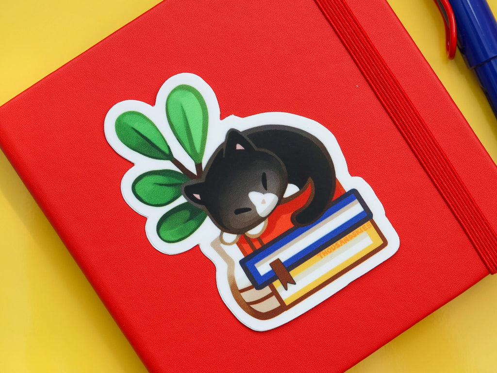 Cat Napping On Books Vinyl Sticker